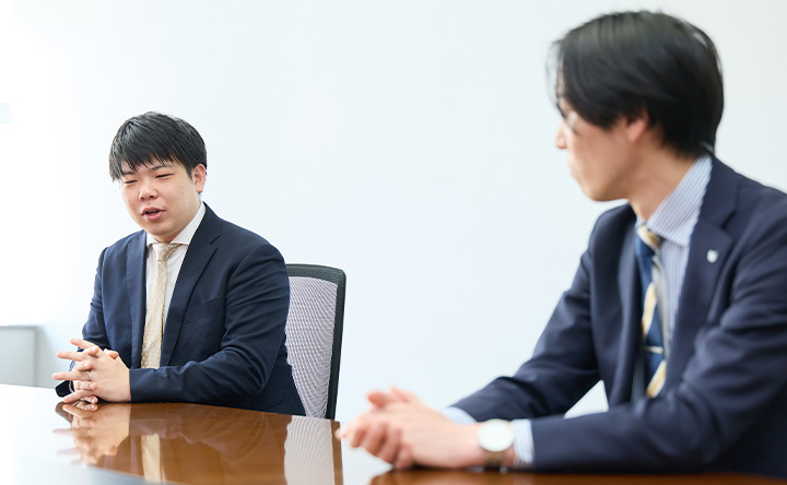 サイバートラスト・佐藤 拓巳さん（左）とキヤノンMJ・伊藤 峻（右）